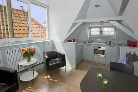 Woonkamer bij Slapen aan het Fnidsen